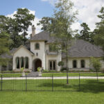 a beautiful house with trees outside