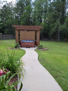 a walkway to the outdoor seating arrangement